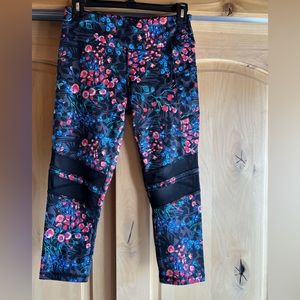 X by Gottex colorful capri leggings with phone pocket on left hip.